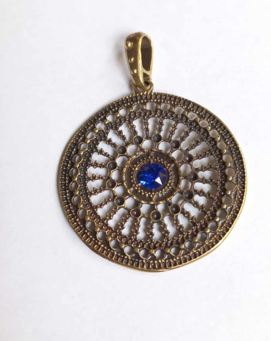 Bronze pendant with blue crystal 